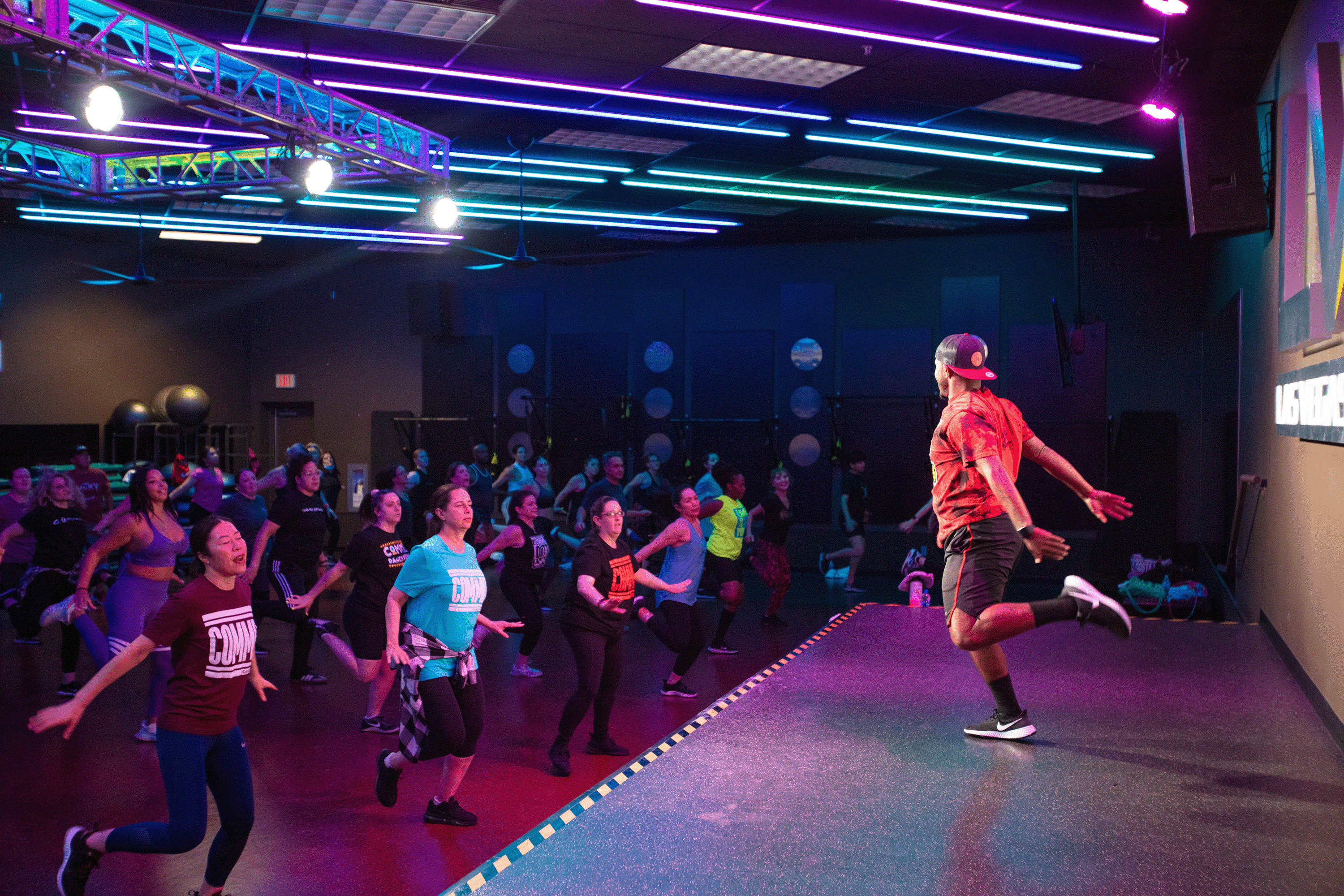 LVAC Members dance together in a COMMIT group fitness class.